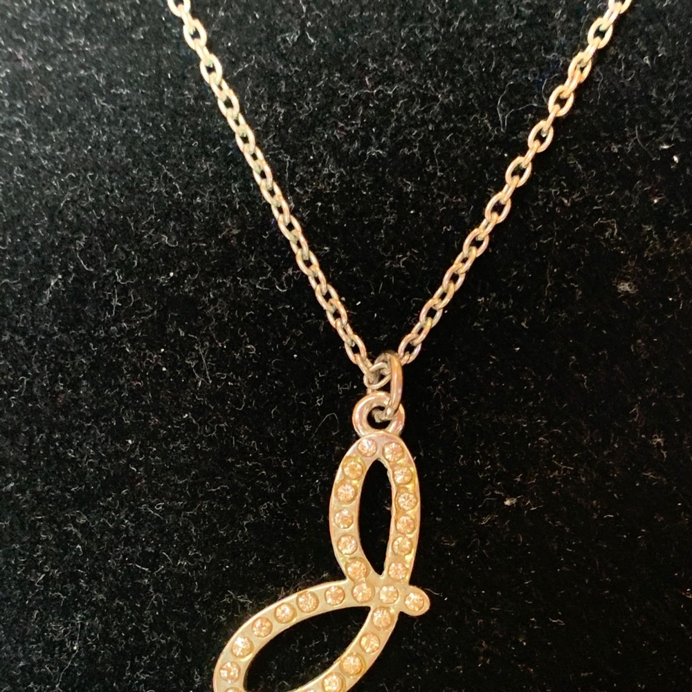 “J” silver tone necklace